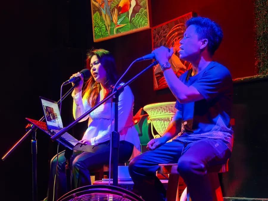 Two singers performing an evening live set at the restaurant